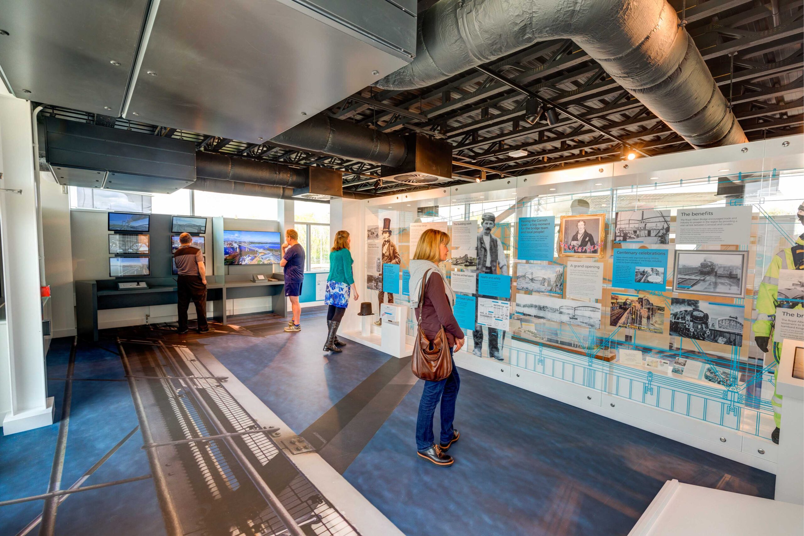 Members of the public visiting an exhibit at the Bridging the Tamar visitor centre