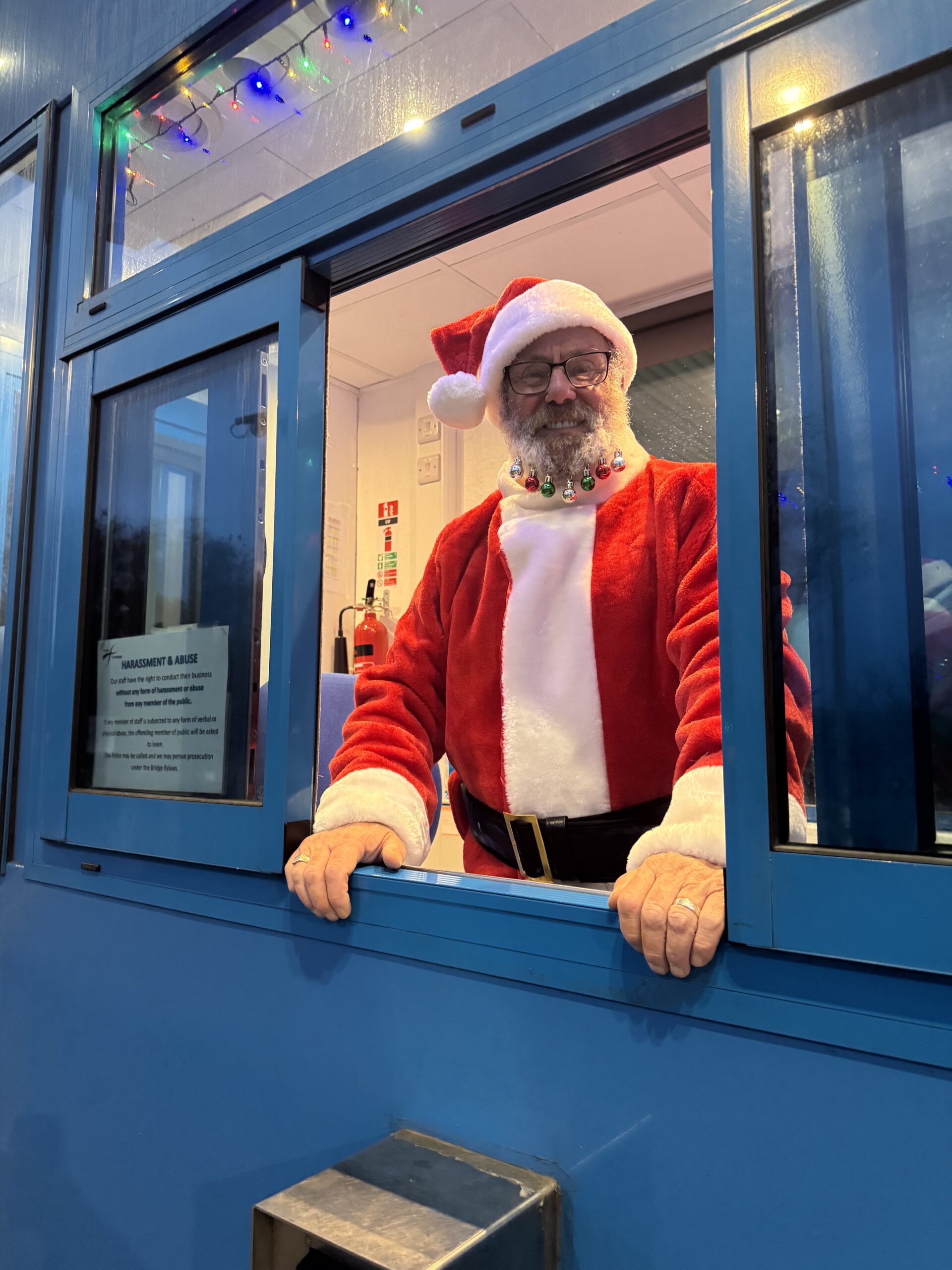 Santa Claus in a toll booth